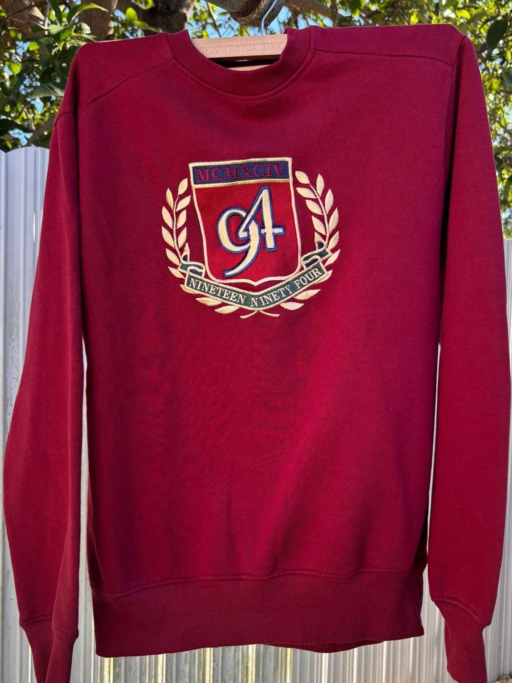 Primark Burgundy Crewneck Sweater with Embroidered Crest